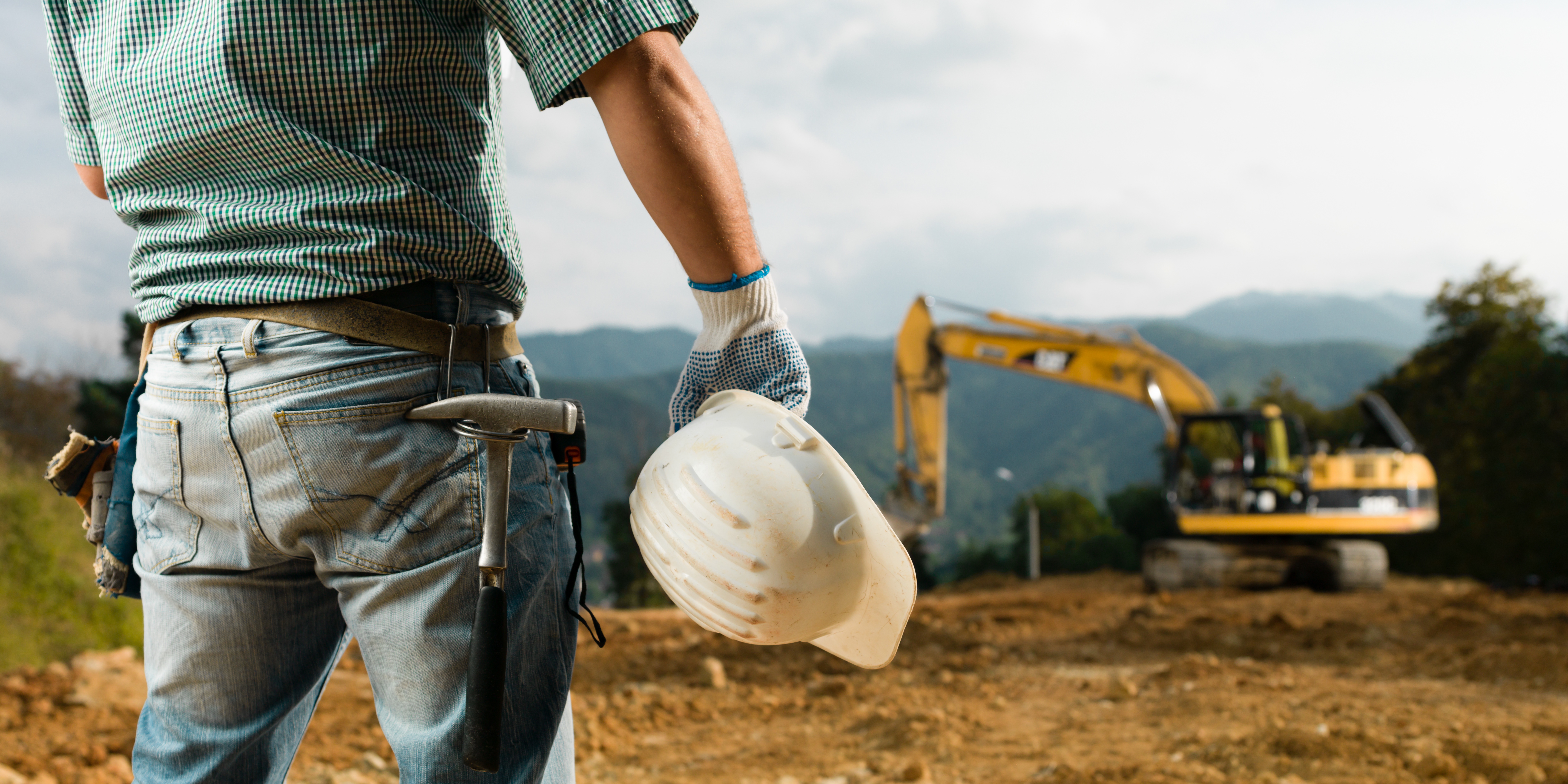 lone worker, construction worker, tractor, hard hat